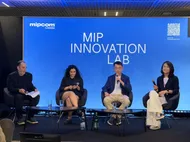 Four panelists seated onstage before a screen reading “MIP Innovation Lab” at MIPCOM Cannes.